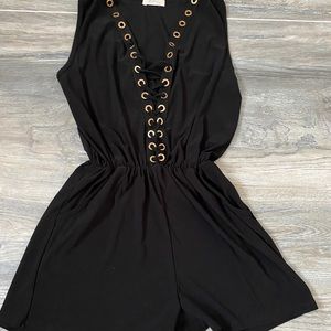 Black Romper With Gold Holes